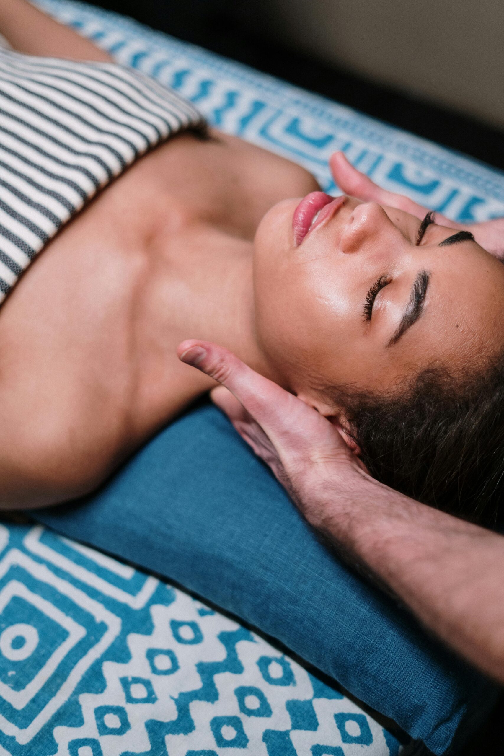 Indulge in a calming facial massage in a luxury spa setting, promoting relaxation and wellness.